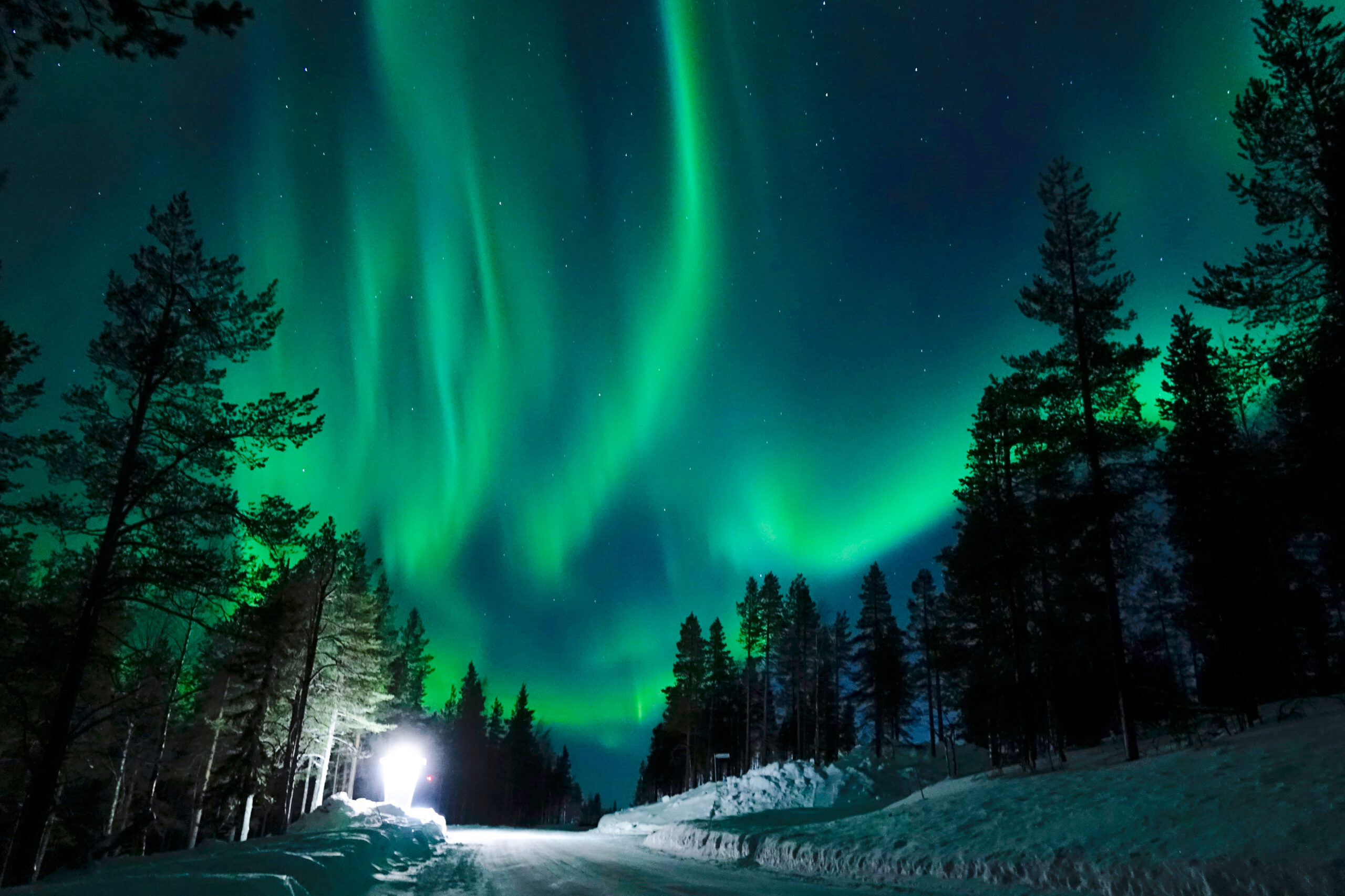 Bright,Lamp,Shining,On,The,Empty,Snowy,Road,Just,As